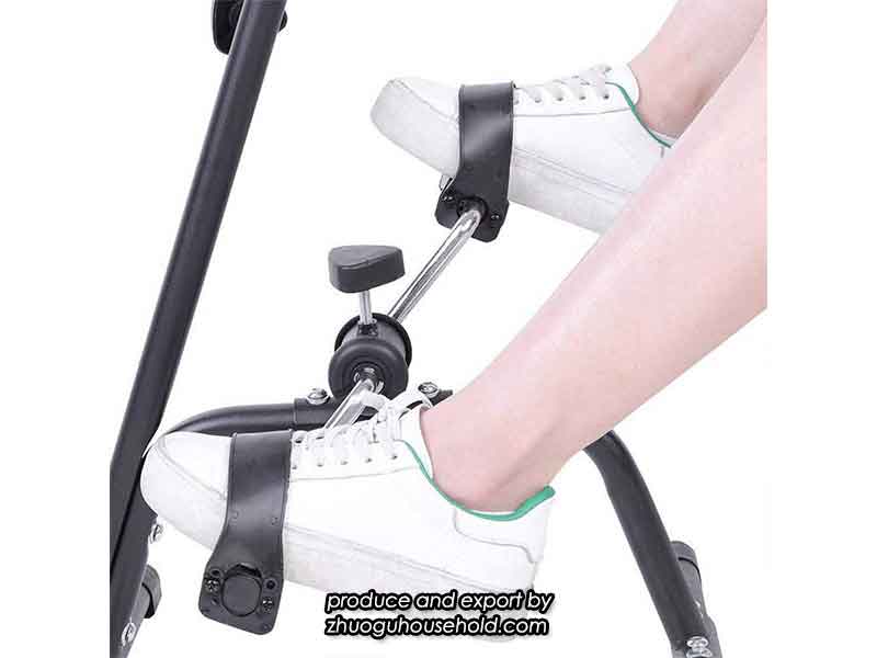 Close-up of stable leg exerciser base for physical therapy pedal machine