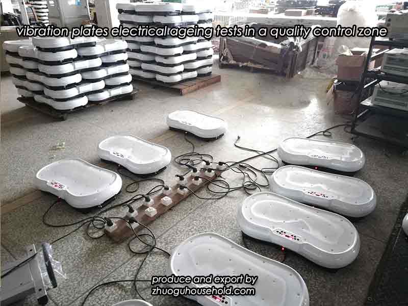 Rows of 3D vibration plates undergoing 24-hour electrical ageing tests in a quality control zone.